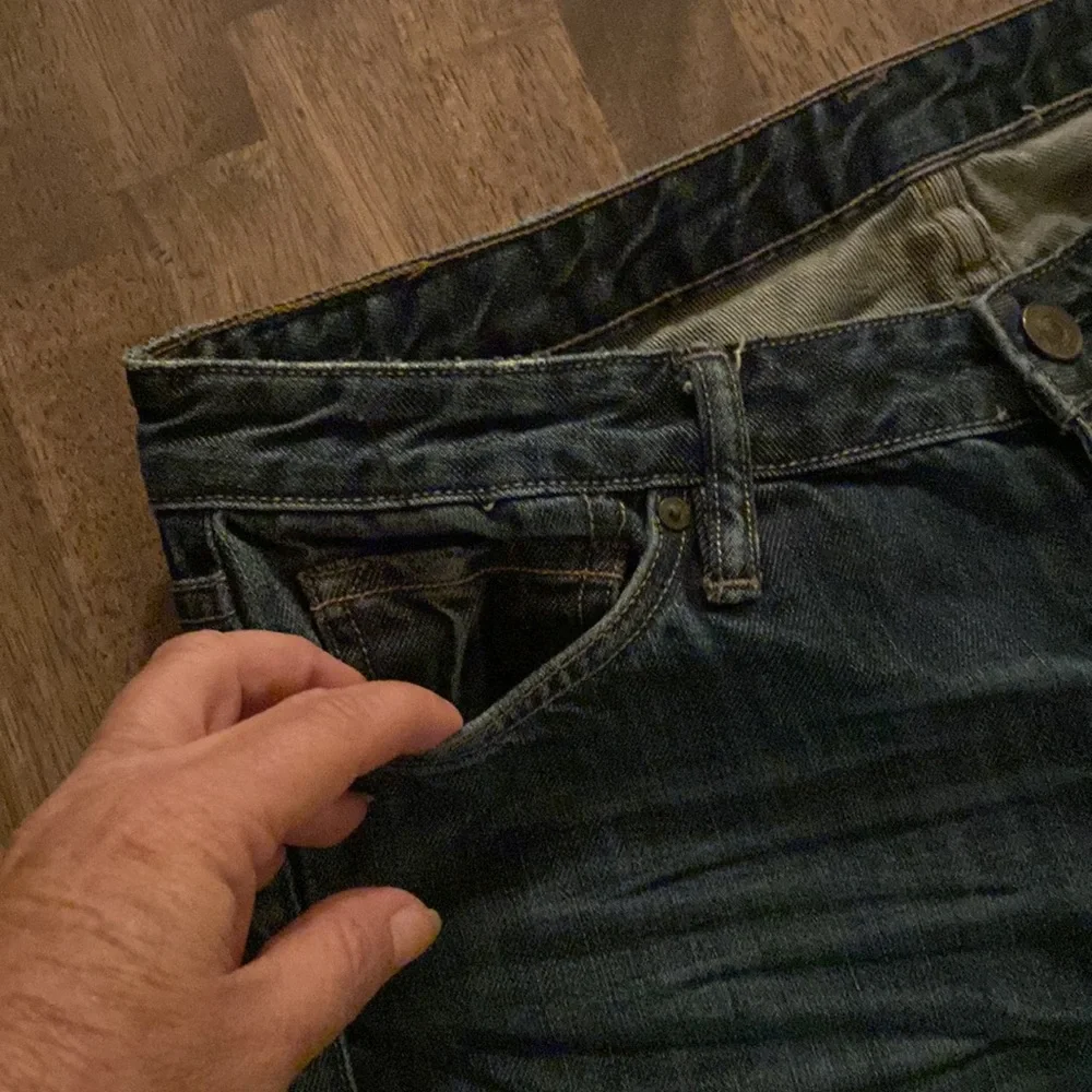 All Saints Spitalfields Jack’s Place skinny dark blue jeans from Neiman Marcus